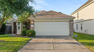 Image of residential garage and driveway.